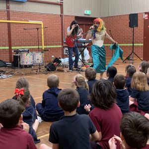 Just Add Music JAM Band performing at East Para Primary School Adelaide South Australia Nick Russell dressed up as a mermaid Mark Curtis playing guitar