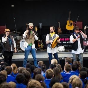 Eve Ormsby and Nina Verlingieri and Mark Curtis and Elijah Maddern and Jono Ruse and Nick Russell in wellerman costumes performing at a JAM Band show in Adelaide South Australia
